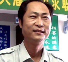 譚國深
